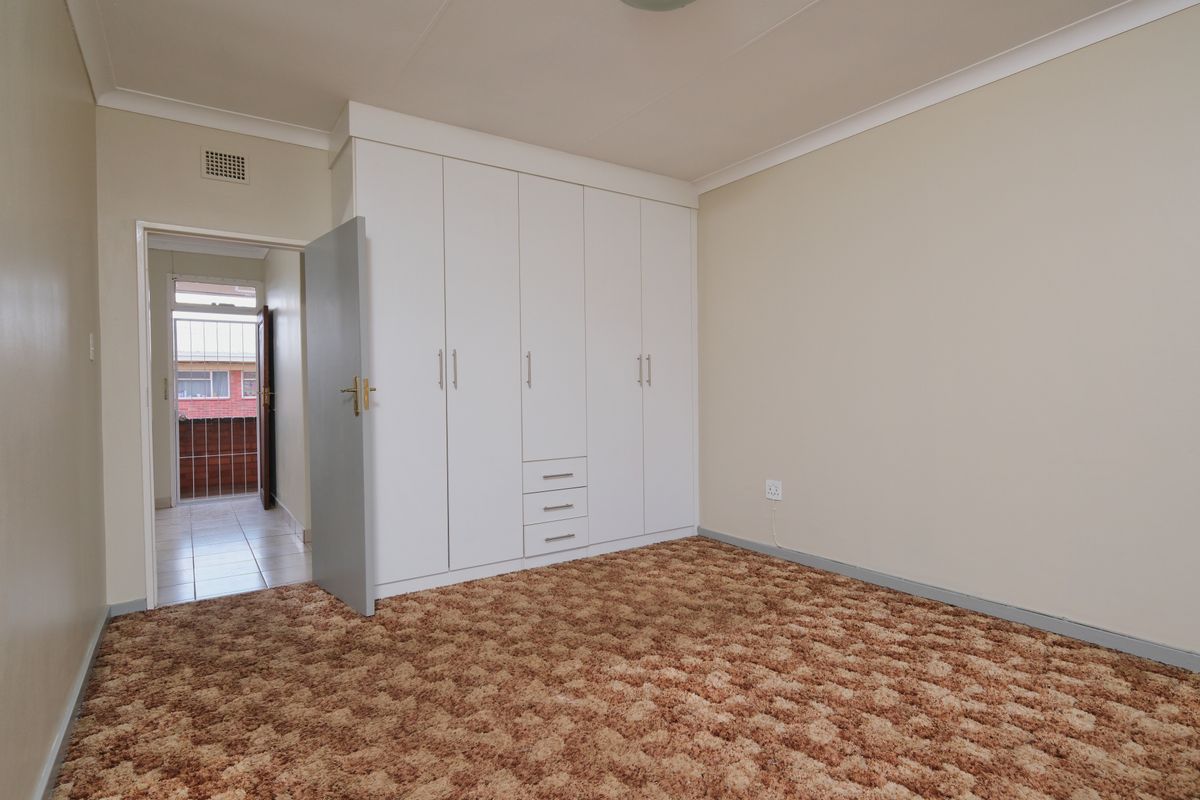 Sfeerbeeld van een ingebouwde kast in de slaapkamer
